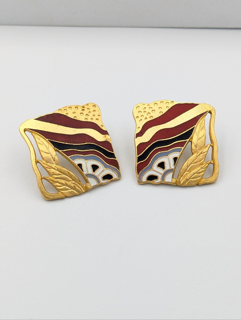 Vintage signed Nuri earrings gold tone enamel nature inspired abstract design